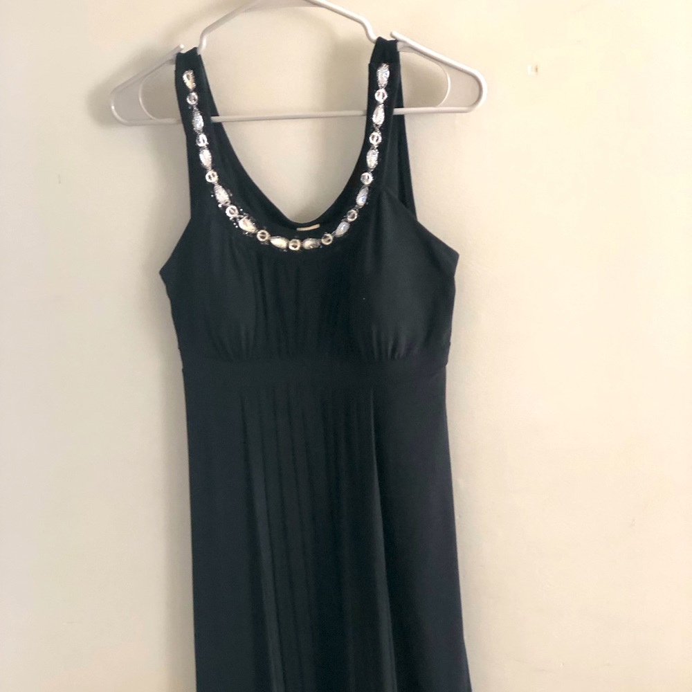 Black empire waist dress with rhinestone neck line.